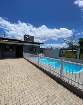Casa com piscina capão da canoa